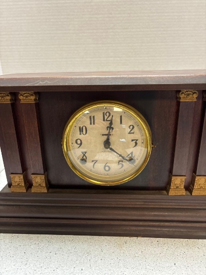 antique Ingraham Mantle clock with pendulum and key