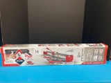 Light and easy tile cutter open box