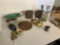 vintage metal masks, plate, bell, candle stand, wheelbarrow and cast iron praying decor
