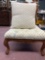 heavily carved slipper chair