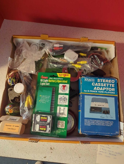 interesting lot of misc items-- 8 track cassette adapter, handcuffs, barometer, eggs, lights, etc