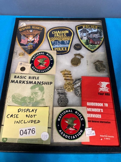 Police rifle badges more