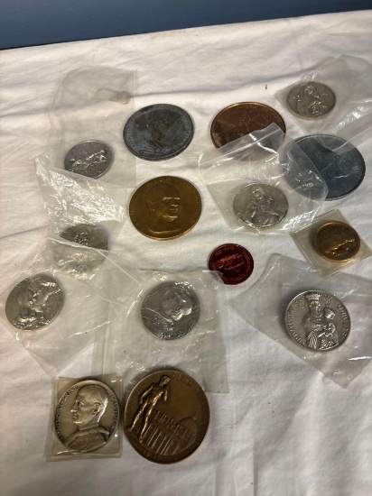 coin medallions religious Nixon etc.
