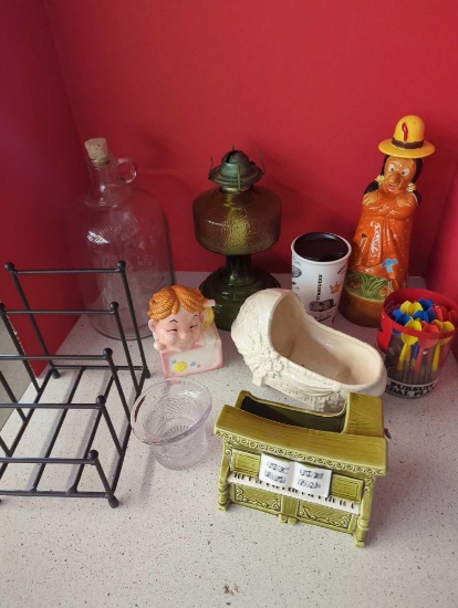 one gallon Geo H Lee co bottle, oil lamp, Indian, planter, darts
