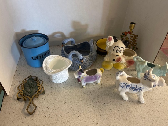 vintage cow pitchers, bowls, and decoration