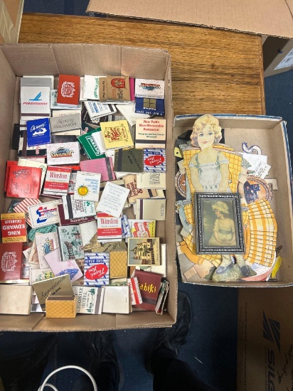antique matches and cardboard clothing cutout