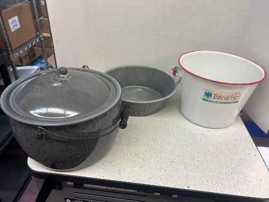 grey enamel ware bucket and white and red enamel ware