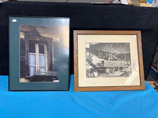 2 framed photographs. cat on window seal and vintage men at work