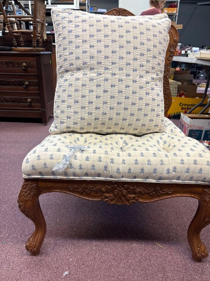 heavily carved slipper chair