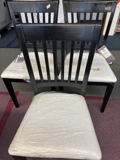 Three contemporary craftsman style dining room chairs