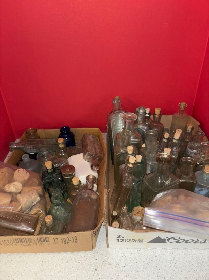 large collection of antique bottles cork stoppers