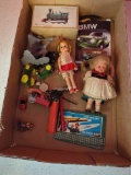 lot of toys-- dolls, vehicles, etc
