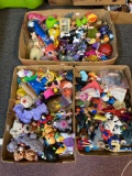 3 flats of miniature toys