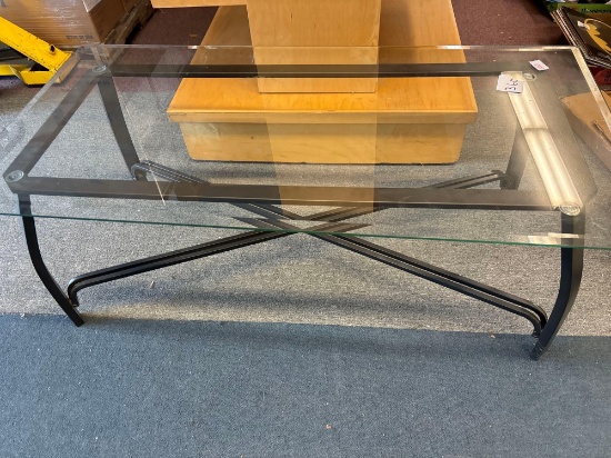 Glass and iron coffee table