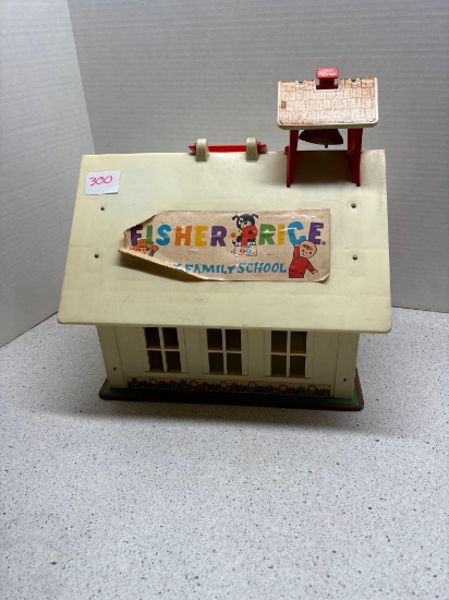 vintage Fisher-Price little people school has most of the letters