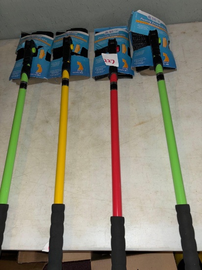four brand new pivoting snow brooms