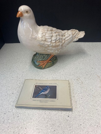 Pigeon figure and Audubon book