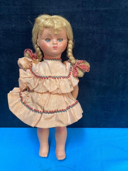 Vintage doll with PF 310 on back