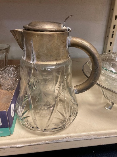 Clear glass lot including etched pitcher with silver lid and glass insert