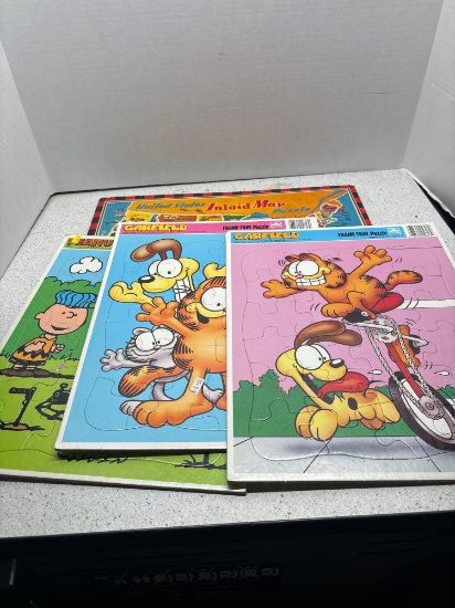 vintage inlaid map puzzle Garfield and peanuts puzzles