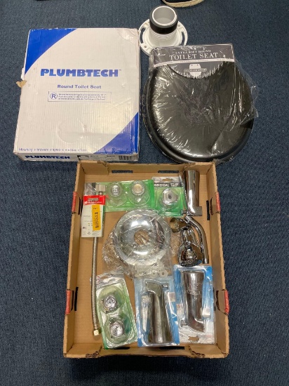 2 New toilet seats and bathroom faucet supplies
