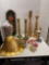 Brass candlesticks, brass knobs, and other home decor