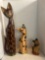 three decorative carved wooden cats