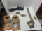 chain belt, Harley Davidson belt buckles, and binoculars