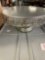 Large lot of baking supplies including 420 cookie cutters, large tote full of wedding cake pillars,
