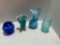 lot of blue glass. flower frog, ruffled vase, pitcher vase, and flower detailed sky blue vase