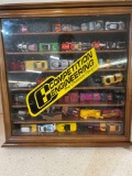 Hot Wheel and Hot Wheel type cars in display case