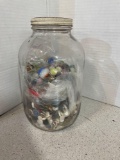 Large glass jar, full of marbles and buttons