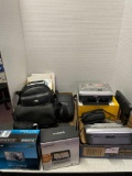 Cameras, bags, Garmin, printer docks