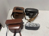 vintage cameras in cases