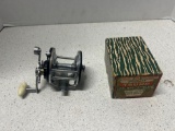 fishing reel and Pflueger Trump level wind fishing reel in box