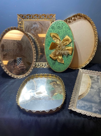 vintage plateau trays, hanging mirrors etc