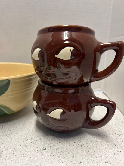 Apple bowl two smiling face mugs