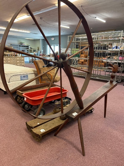 large antique spinning wheel