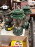 Three Coleman lanterns