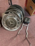 Mercedes and Pontiac Hubcaps and a sissy bar