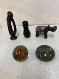 Mother and child soapstone, and a hippo soapstone, Black onyx, Mayan figure, And two paperweights