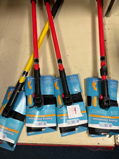 four brand new pivoting, snow brooms