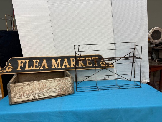 Vintage display rack, 7-Up crate, and flea market sign