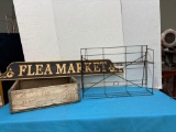 Vintage display rack, 7-Up crate, and flea market sign