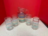 Vintage striped pitcher and four glasses