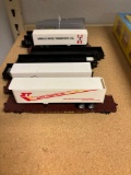 10 HO scale train cars and trailers