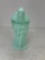 Teal blue Santa Claus glass bottle with top