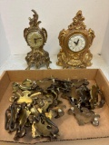 2 rococo style gold gilt clocks, one is cast iron