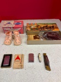Two zippo lighters, Two pocket knives, more