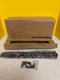 Set of three wall-mounted floating shelves and bronze curtain rod